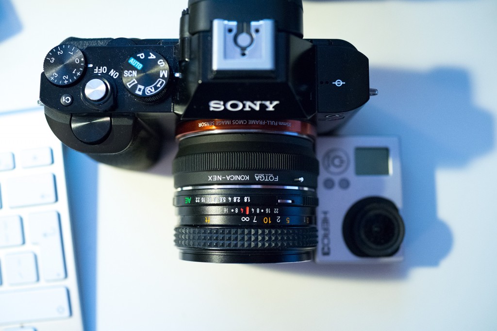 Size comparison: Sony A7R with small Konica lens compared to GoPro